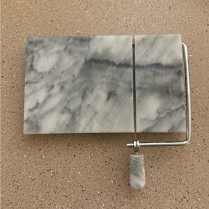 Elegant Marble Cheese Slicer with Gray Handle